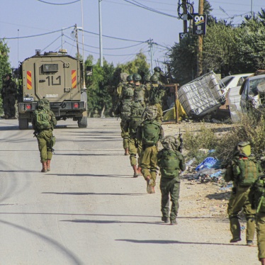 Israeli forces enter the Balata refugee camp in the occupied West Bank city of Nablus during a large-scale search-and-arrest operation on November 23, 2023. 